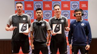 The Islanders with the new JBL headphones
