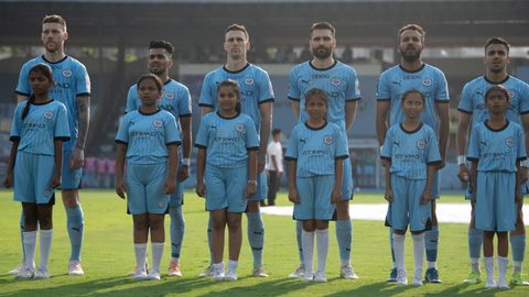 Celebrating Women's Month with young girls escorting players on Matchday