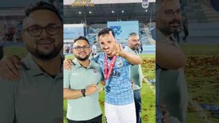 Pitchside with the champions 💙