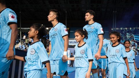Celebrating Women's Month with young girls escorting players on Matchday
